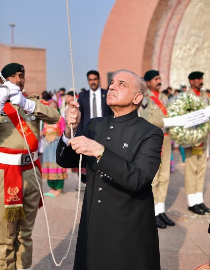 Prime Minister Shehbaz Sharif hoisted the national flag to commemorate an Independence Day event in the federal capital Islamabad. - Credits: APP